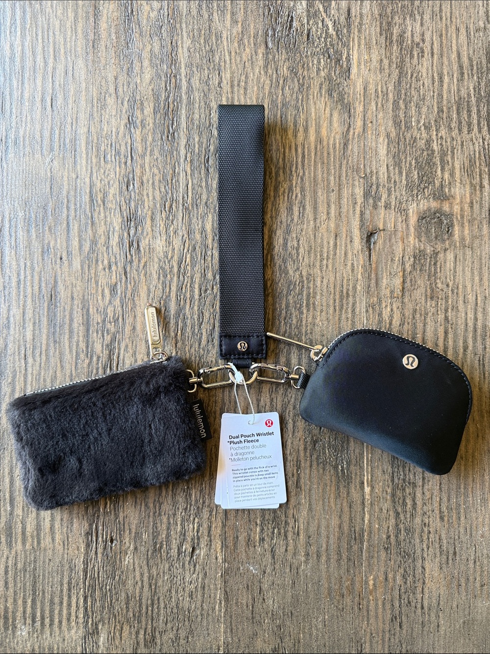 lululemon black wristlet pouch set with faux-fur and neoprene pouches